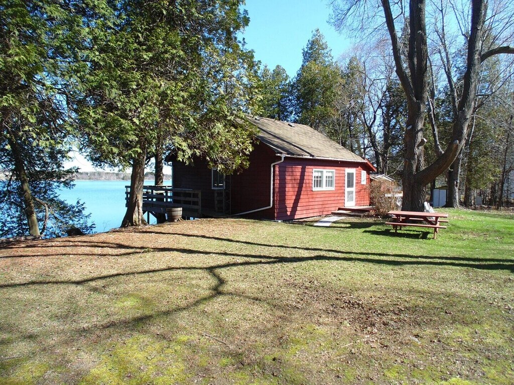 waterfront cabin with a bunk house