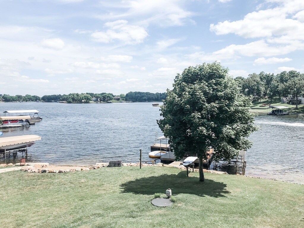 lakefront property iowa | beautiful family-home with a lake view
