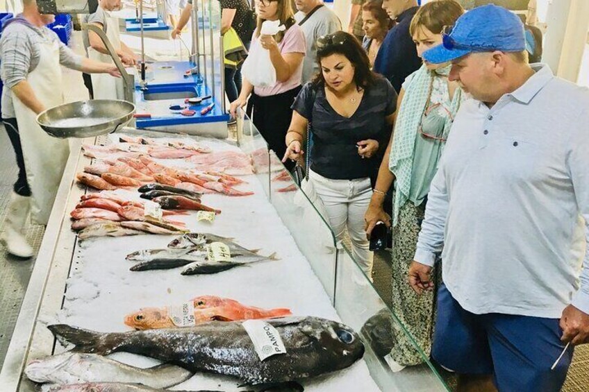 Visiting the local market.