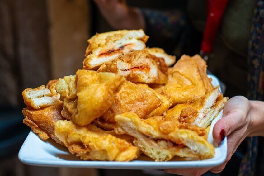 Must try Venetian Style Fried Mozzarella at a few centuries- old- restaurant.The name really doesnt do it justice. Food and wine tour in Venice