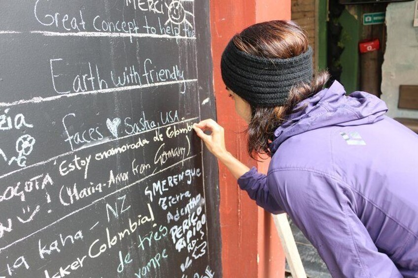 Signing iconic wall in multiple languagues