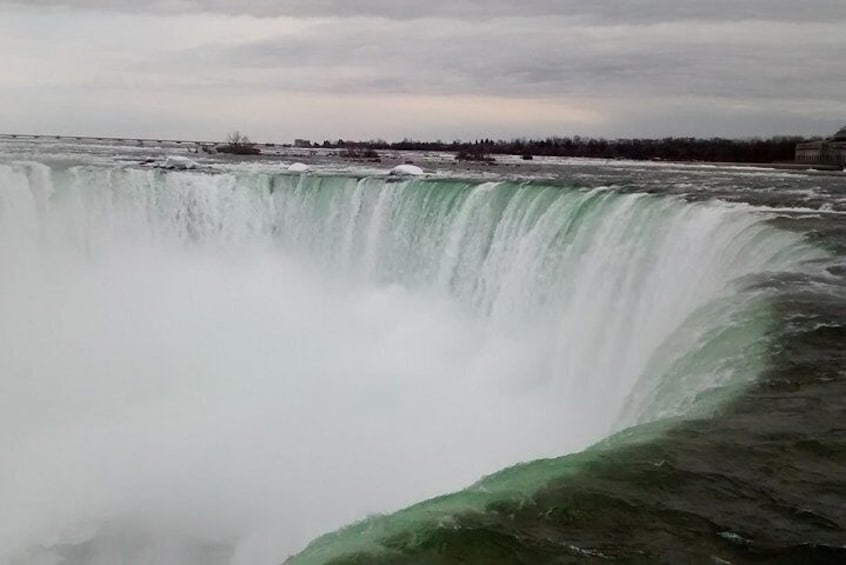 Walk to the brink (edge) of the falls (included)