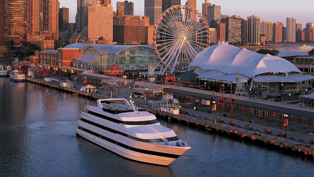 cruise ship sailing past navy pier in chicago