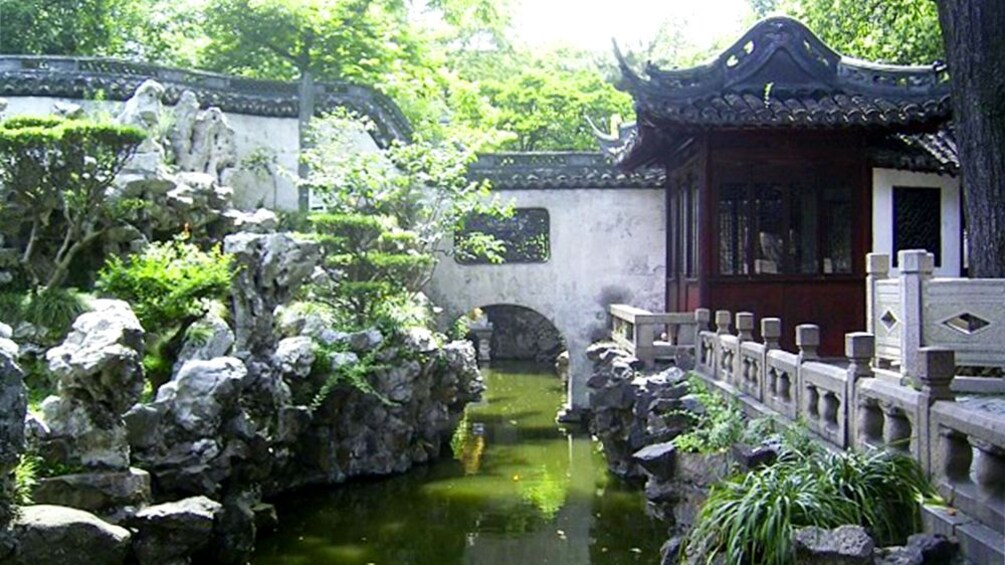 Pond bridge and building in Shanghai 