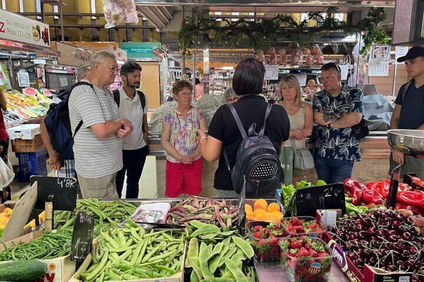 Vegetable Paella cooking class, tapas and visit market