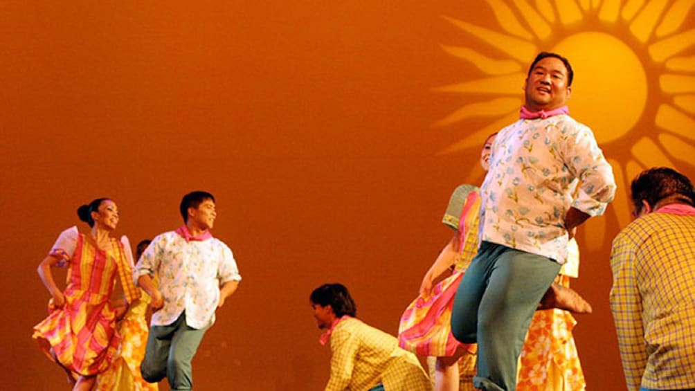 Dancers performing onstage in Manila
