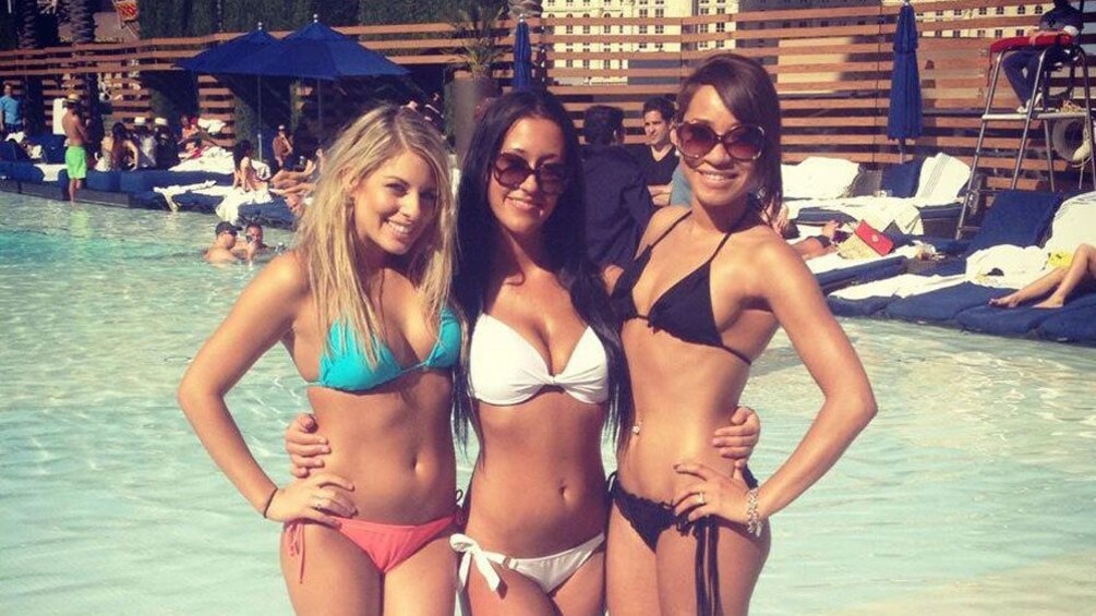 Group of girls in bikinis in front of the pool at the Rockstar Pool Party in Las Vegas