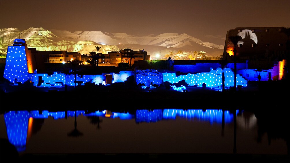 illuminated stone columns in luxor