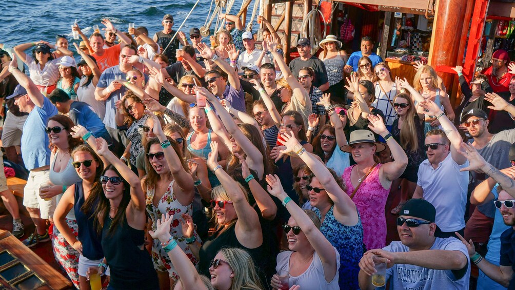 View of audience dancing along to performance during Sunset Cruise in Puerto Vallarta