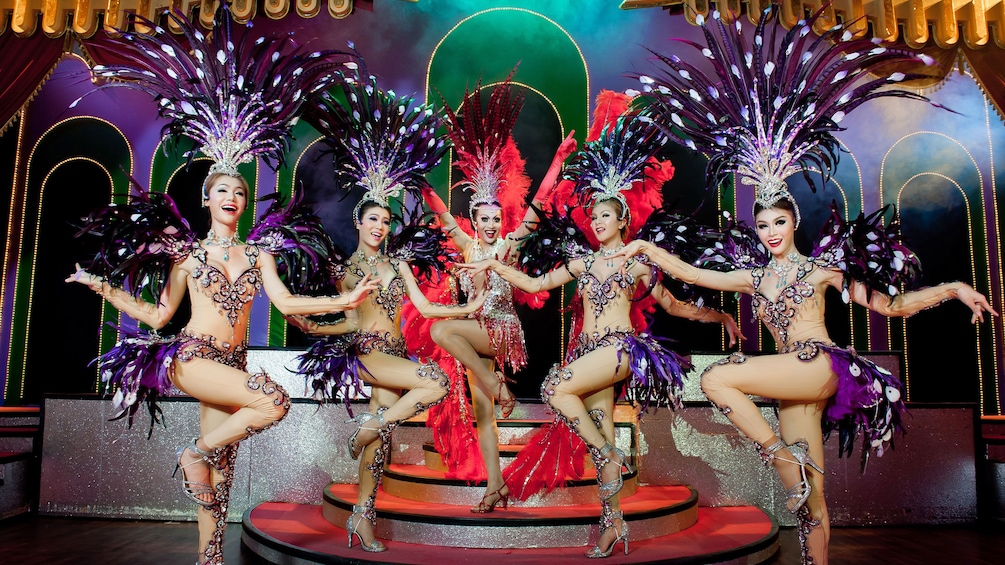 Elegant fan dancers at the Simon Cabaret Show in Thailand