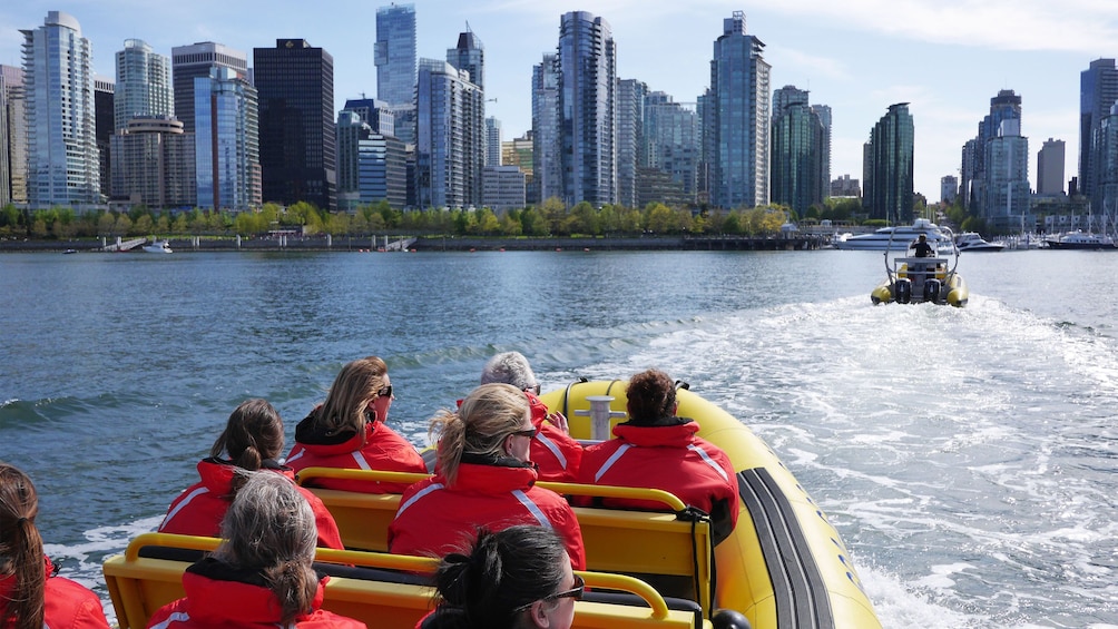 Raft moving towards the city in Vancouver