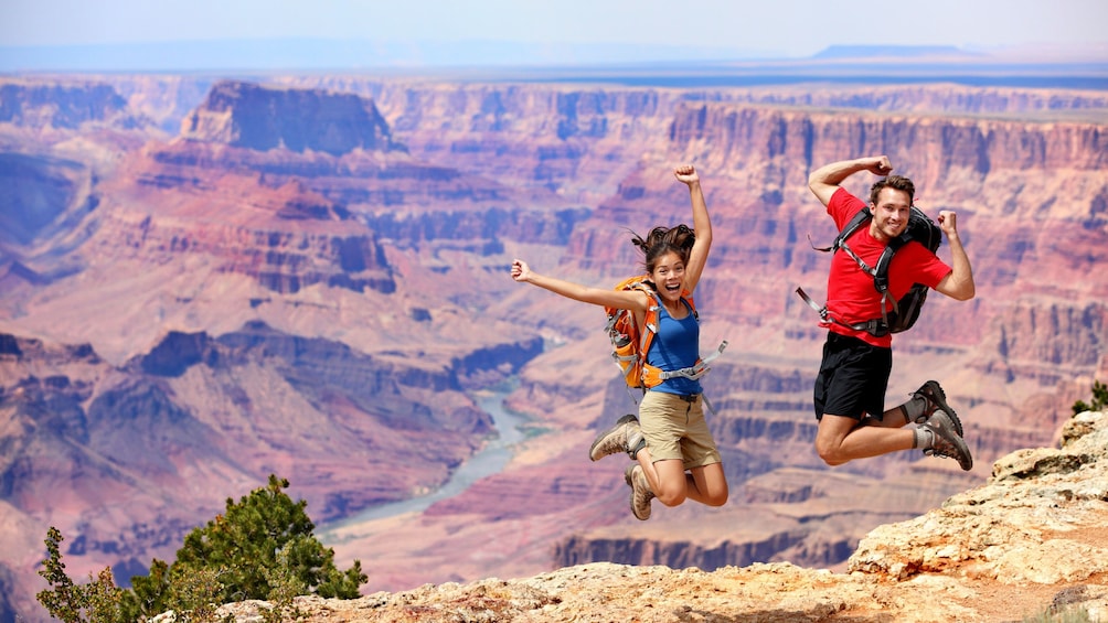 Couple celebrate their arrival to the Grand Canyon
