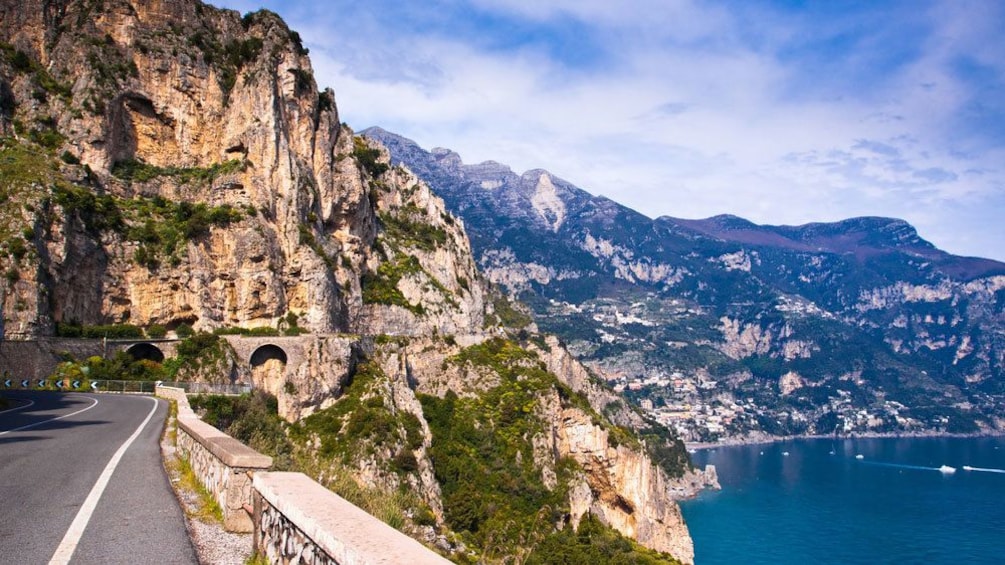 Road to Amalfi overlooking the coast with mountains in the distance
