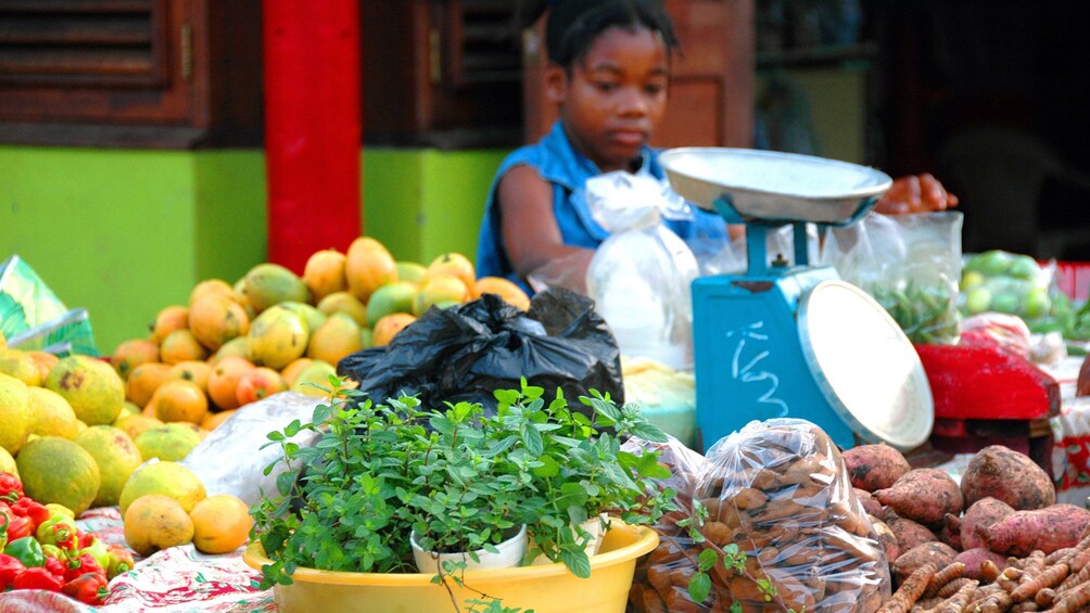 View of the bustling environment of a St. George's marketplace in Grenada 