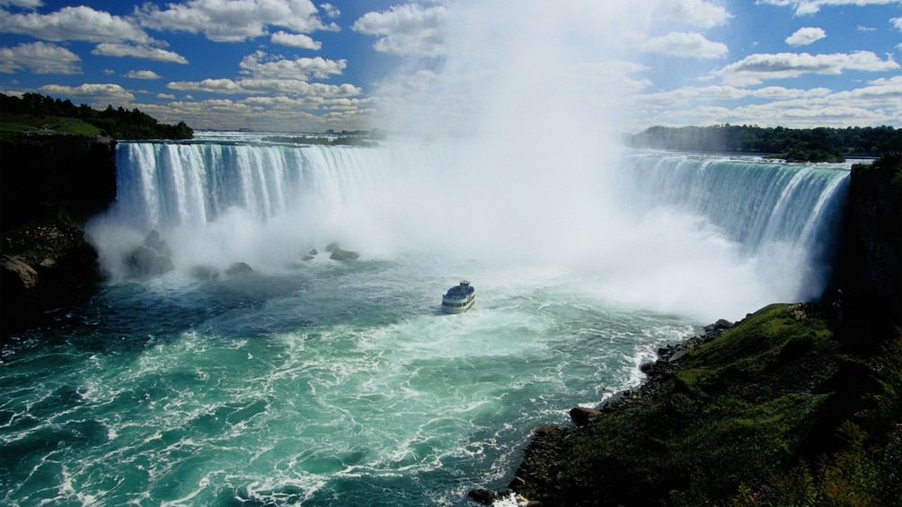 passenger boat near the bottom of the waterfall at Niagara