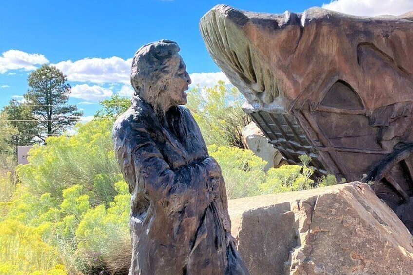 Sculpture of an Indigenous man at the Old Santa Fe Trail monument. 