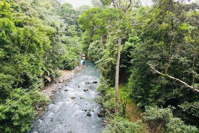 3 in 1, zipline over blue river, tubing on blue river and sloths