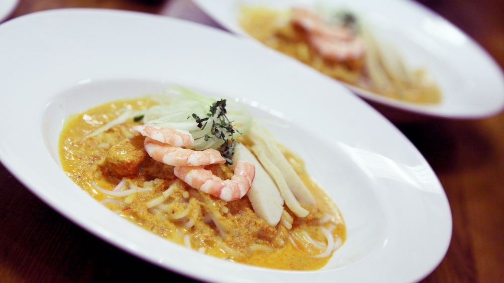 Two curry dishes made at the cooking class in Singapore