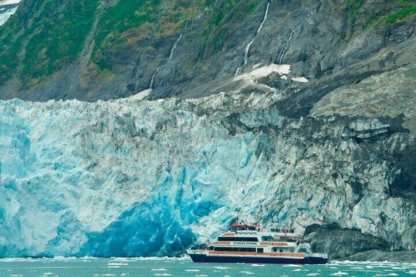 Towering mountains and valleys filled with glaciers. - Phillips Cruises & Tours, LLC