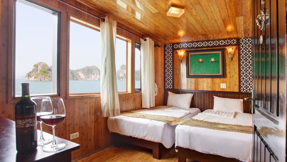 double beds inside the living quarters of the boat in Hanoi