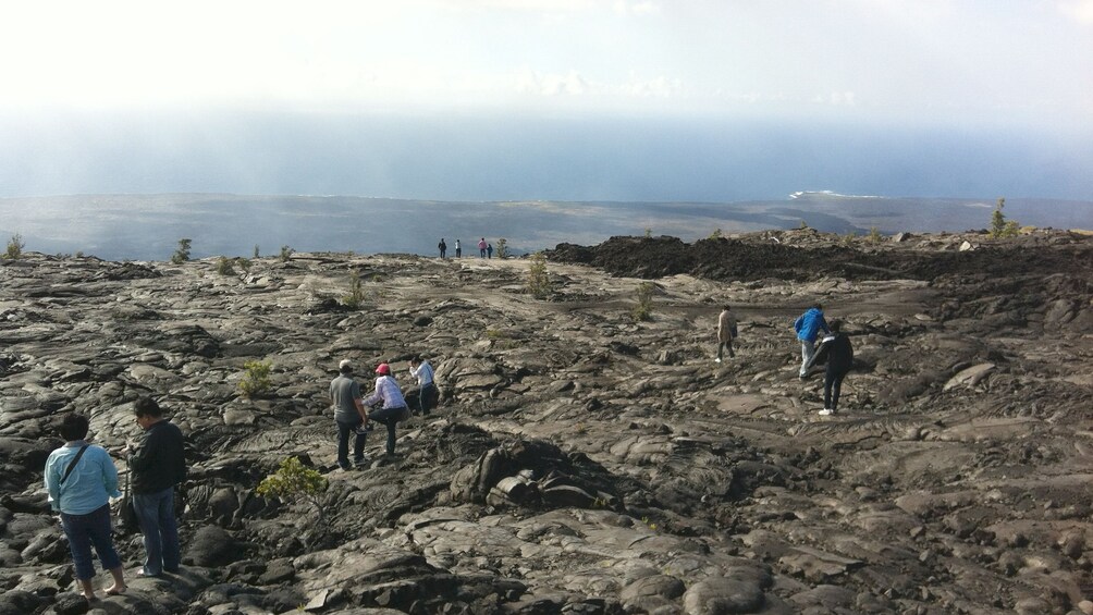 Tourists on the kaka Falls & Kilauea Volcano in Hawaii 