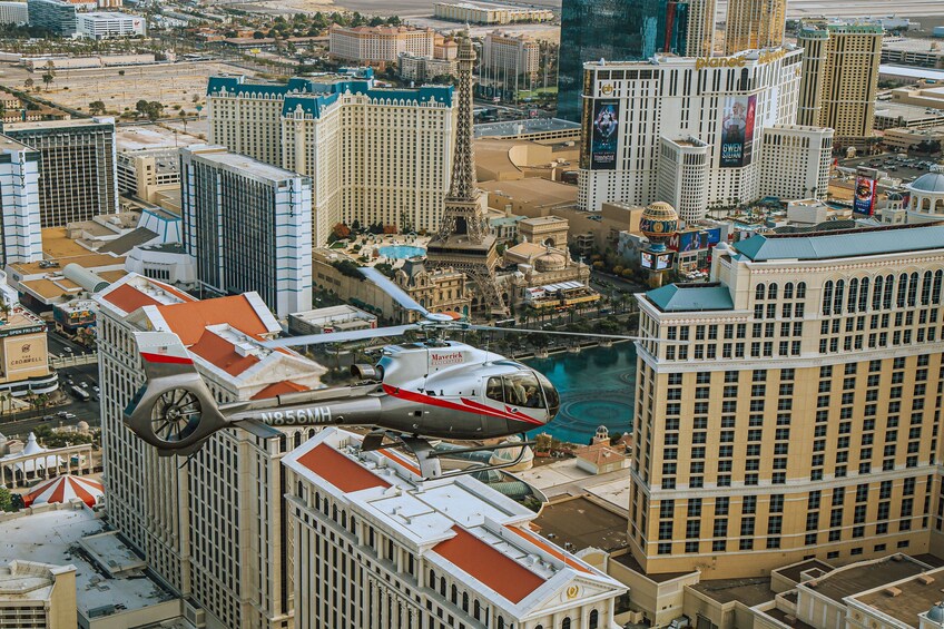 Helicopter flying above iconic Las Vegas hotels 