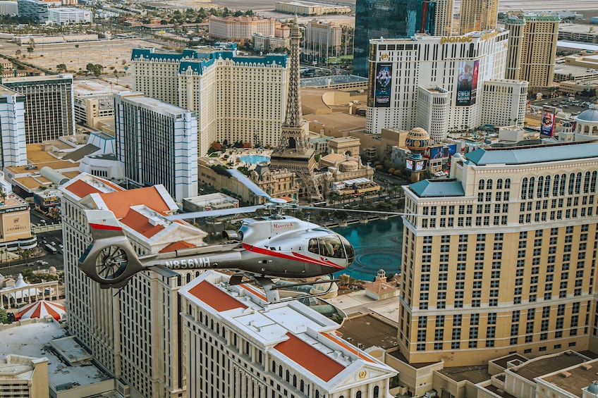 Helicopter flying above iconic Las Vegas hotels
