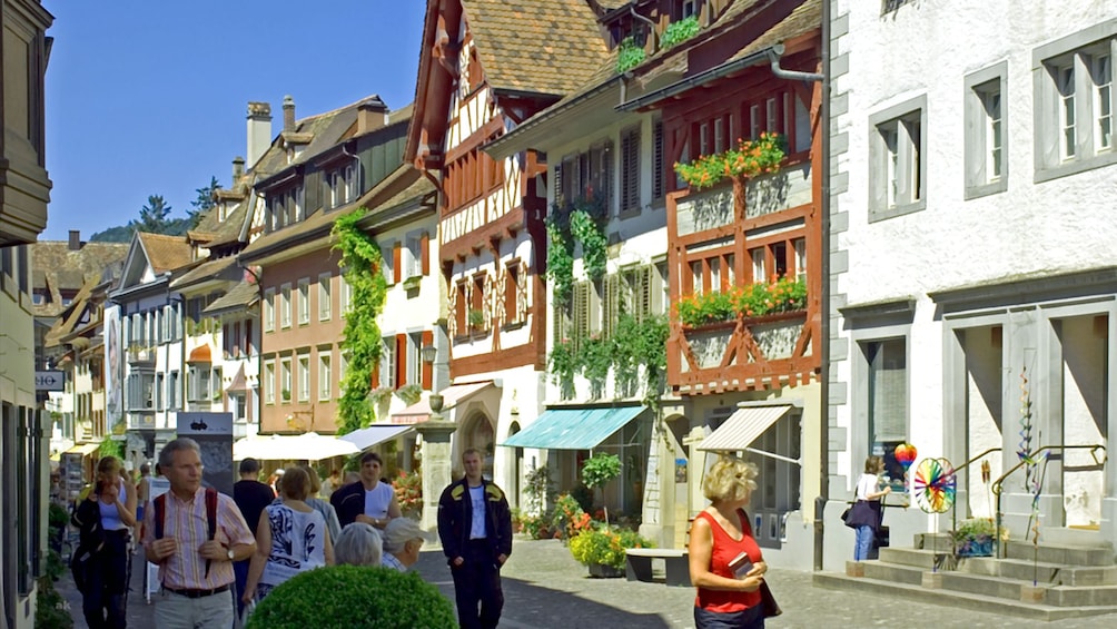 People walk down the streets of Stein am Rhein