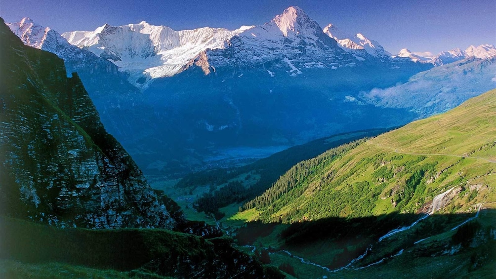 mountains casting a long shadow in Switzerland