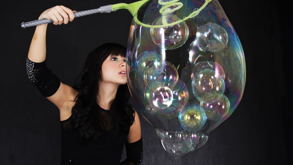 performer in bubble show
