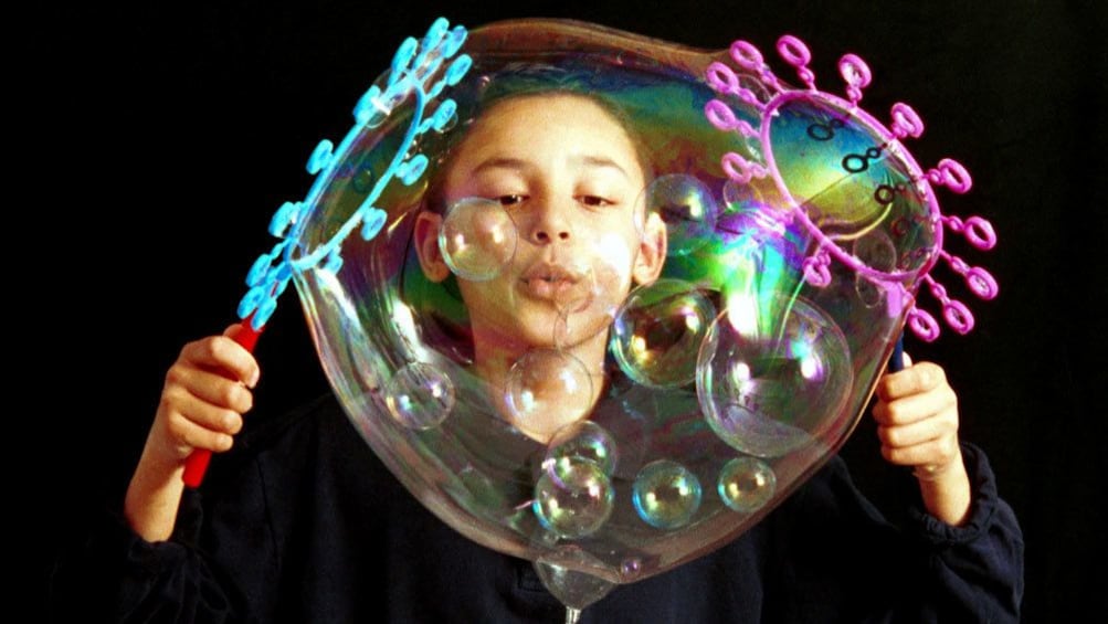 performer in bubble show