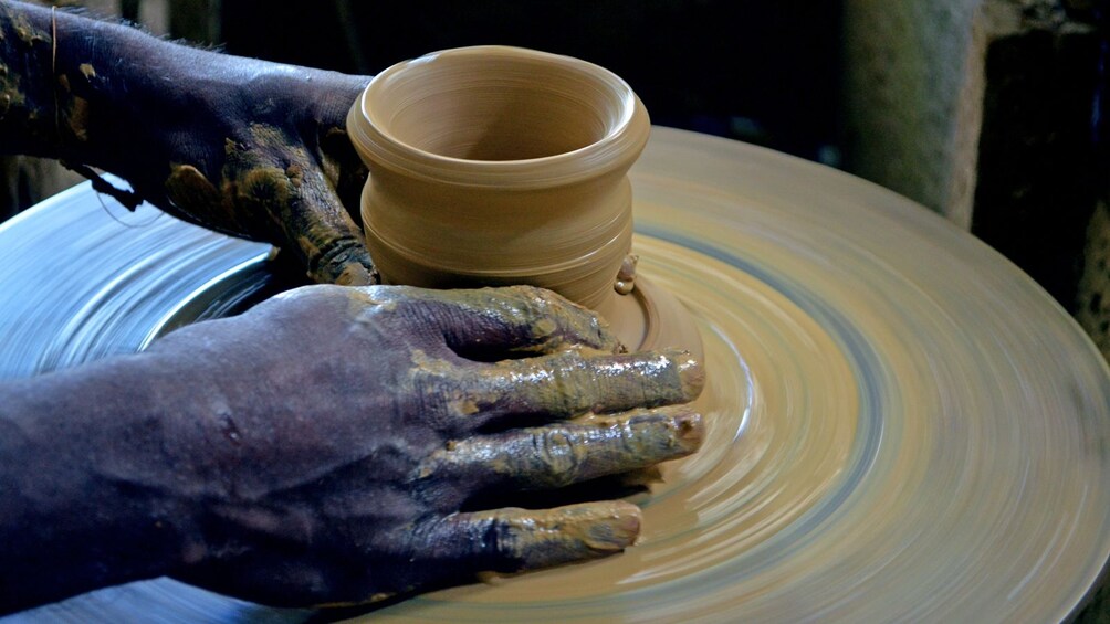 handcrafting clay pottery in Trinidad and Tobago