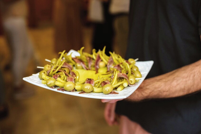 Paella and Tapas Cooking Class in Madrid with Market Visit