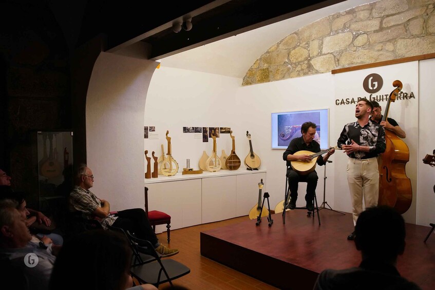 Picture 2 for Activity Porto: Fado Concert with Port Wine in Historical Music Store