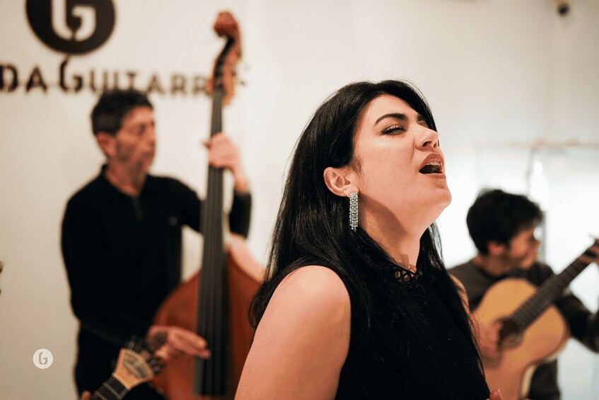 Picture 3 for Activity Porto: Fado Concert with Port Wine in Historical Music Store