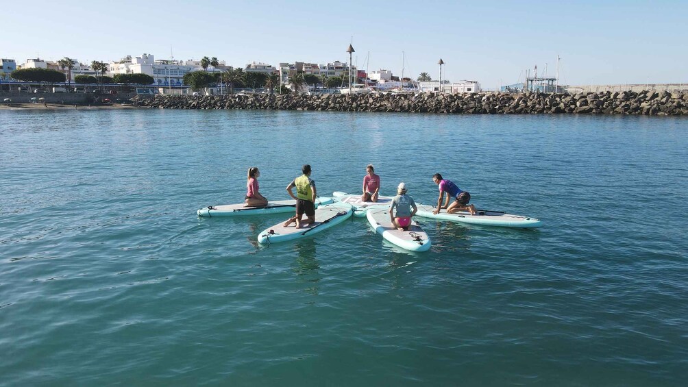 Picture 3 for Activity Arguineguín: Stand-up Paddleboard Yoga Class with Instructor