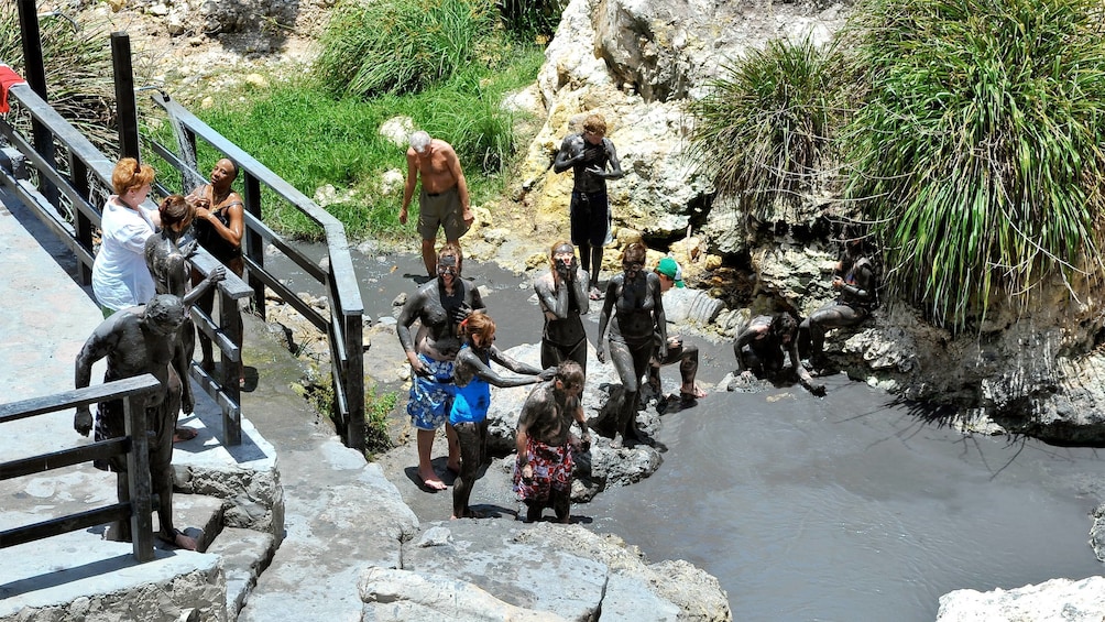 Group enjoying the Mud Baths tour in St. Lucia