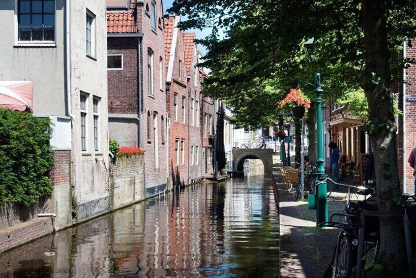 Small canals with houses with crooked facades
