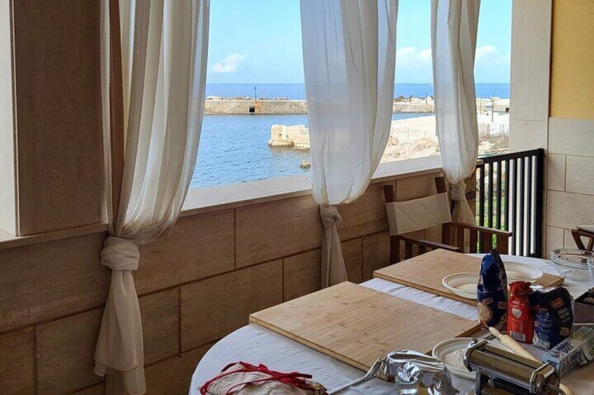 Learn how to make Sicilian traditional cannoli with sea view