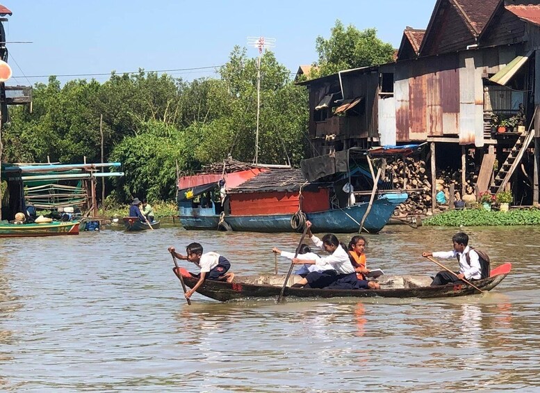 Siem reap floating village Kampong Phluk sun set with Boat