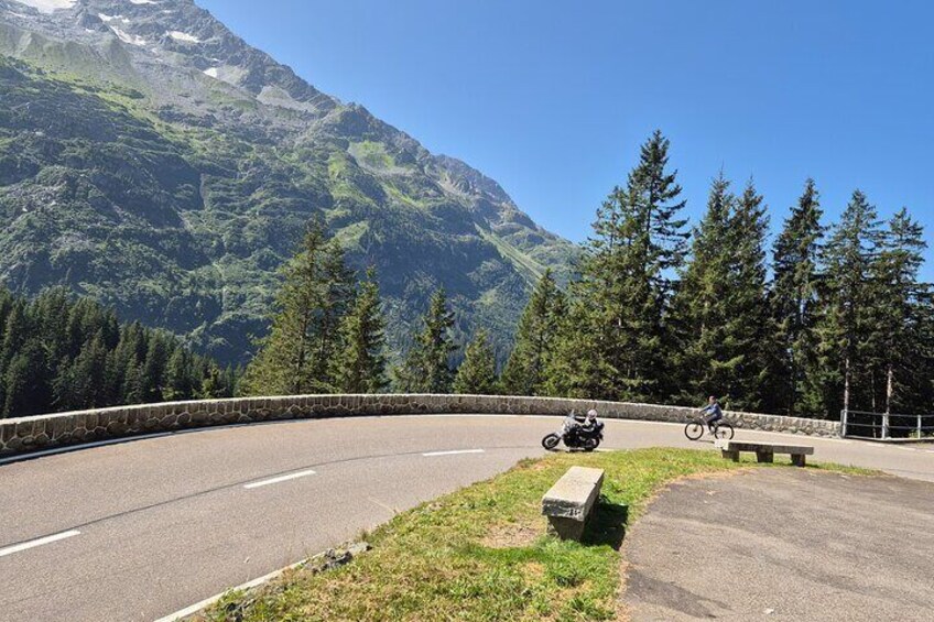 Alpine Pass Descent: Downhill Cycling Adventure in the Swiss Alps