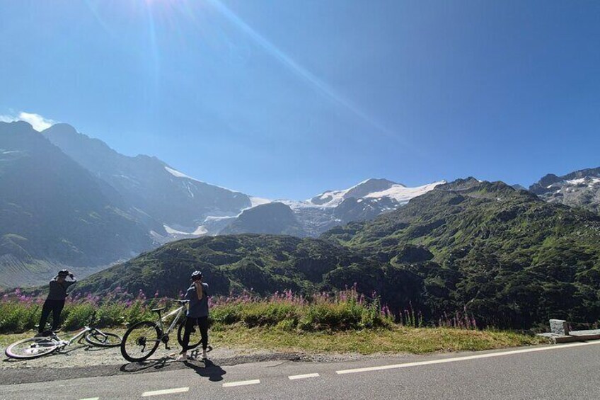 Alpine Pass Descent: Downhill Cycling Adventure in the Swiss Alps