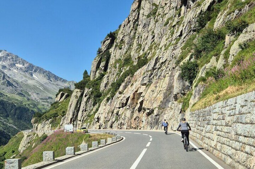 Alpine Pass Descent: Downhill Cycling Adventure in the Swiss Alps