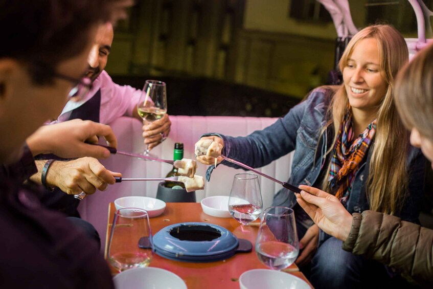 Picture 1 for Activity Geneva: tour with fondue and wine in TukTuk