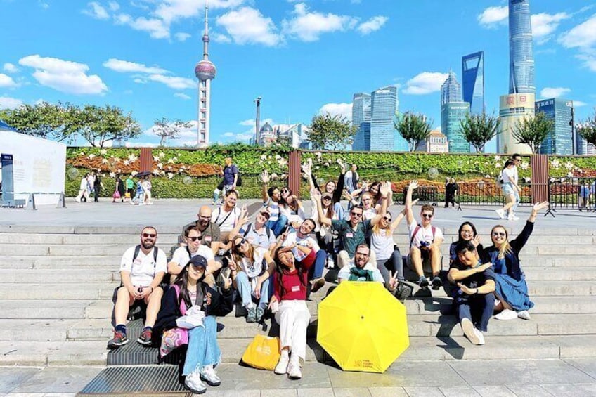 Happy Group Photo by Pudong Skyline