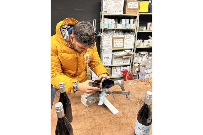 Labeling some bottles of wine