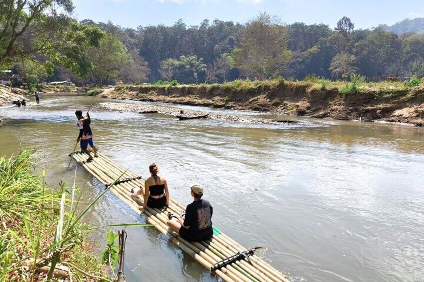 Experience the beauty of jungle while Bamboo Rafting on the peaceful Wang River