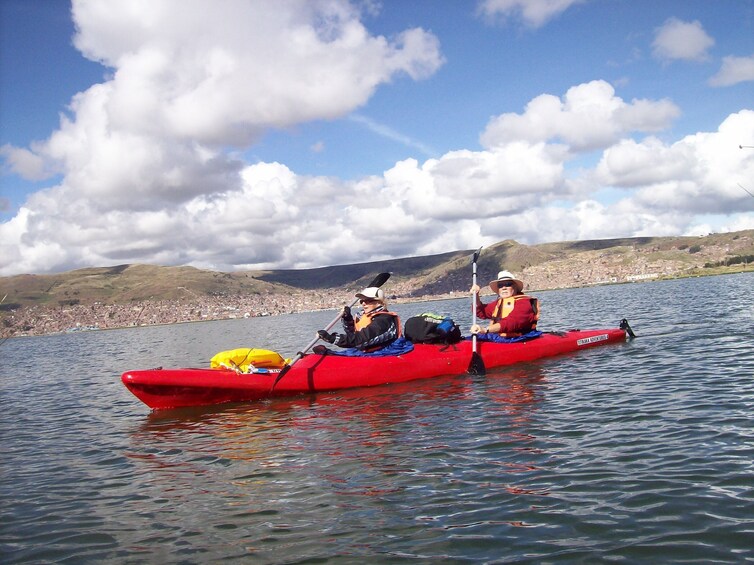 Kayaking by The Uros Island
