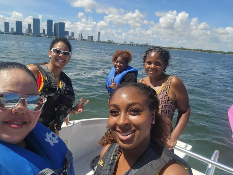 Ultimate Water Experience : Boat Tour with Jetskis, Tubing, and Open Bar