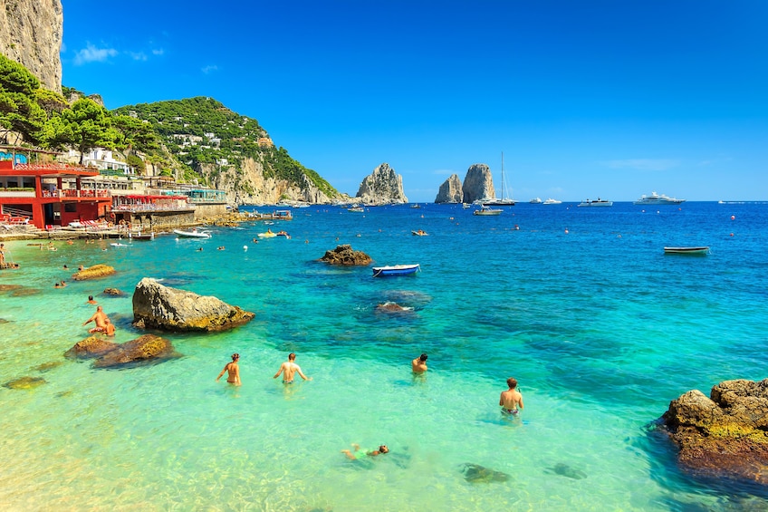 Tourists swimming on the island of Capri